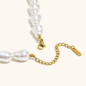 Baroque pearl necklace with 18K gold plated clasp and adjustable chain detail