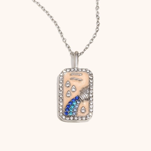 Collier Verseau en acier plaqué 18K avec cristaux bleus et bordure de zircons blancs