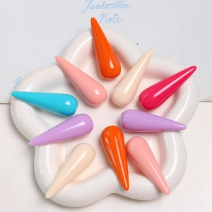 Colorful water drop resin charms in a star tray for DIY jewelry making accessories