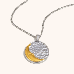Collier vintage en acier inoxydable plaqué or 18 carats avec pendentif soleil et lune