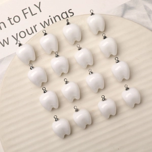 Set of 16 cute ivory white resin tooth charms with silver metal loops for DIY jewelry