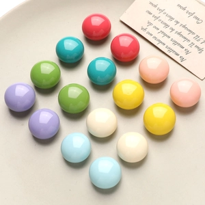 Macro shot of colorful macaroon cream resin beads for DIY earring and jewelry making
