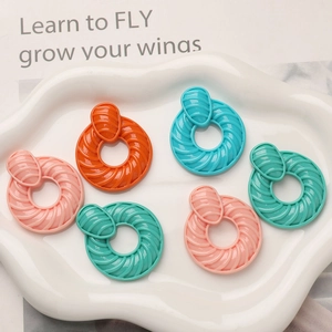 Breloques d'oreilles rondes en résine à texture spirale en rose, orange, bleu et vert