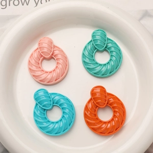 Boucles d'oreilles rondes en résine à texture spirale en rose, turquoise, bleu et orange