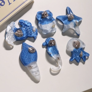 Marine resin charms set featuring sea star and shell shapes with blue crackle finish