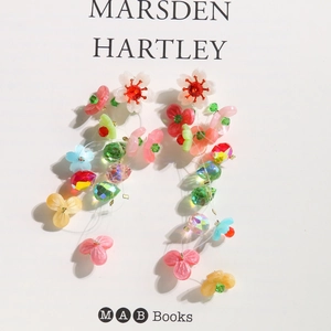 Colorful floral fringe earrings with crystal beads and resin petals for a summer vibe