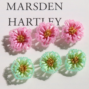 Handmade woven bead flower charms in pink and green for DIY jewelry making and earrings