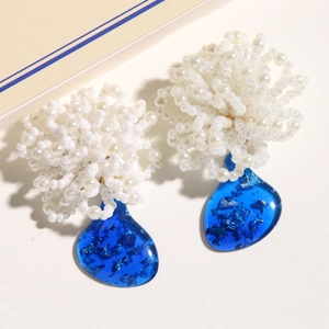White pearl cluster earrings with deep blue resin waterdrop pendants and silver foil