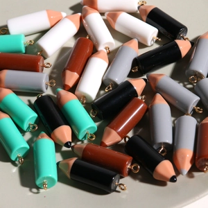 Colorful resin pencil charms for DIY jewelry making with gold-tone metal hanging loops