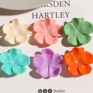 Matte flower resin charms in six pastel colors for DIY jewelry making and hair accessories
