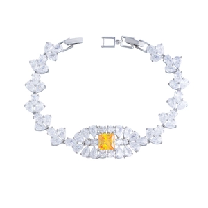 Lujosa pulsera plateada con gema amarilla y circonitas con corte de pera
