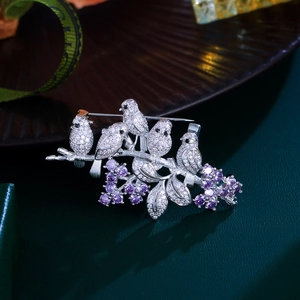 Elegant silver brooch featuring five birds on purple tulip branches with zircon inlay