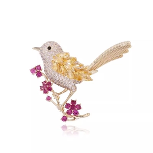 Elegant bird brooch with colorful zircons on floral branch for women clothing