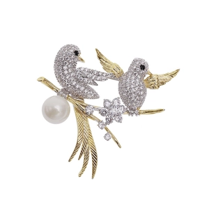 Elegant gold and silver plated double bird brooch with white zircon and large pearl