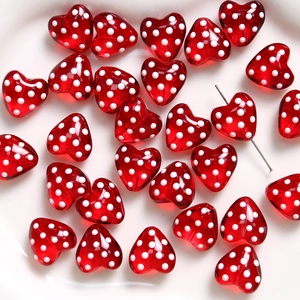 Red heart-shaped glass bead with white polka dots for DIY jewelry making and crafts