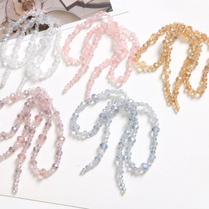 Charmantes perles en cristal à facettes faites main en rose et or pour la création DIY