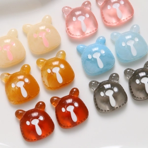 Macro detail of colorful jelly-colored resin bear charms with unique marbled textures