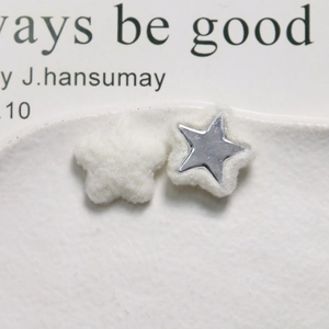 Close-up of plush star patches with metallic mirror finish for DIY hair accessories