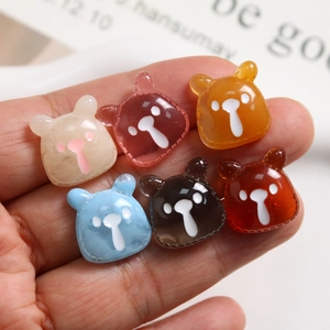 Detail of colorful resin bear charms for DIY jewelry making and phone case decoration