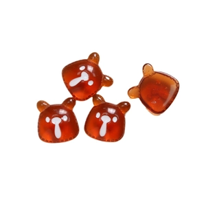 Cute amber resin bear charms with painted white faces for DIY craft accessories