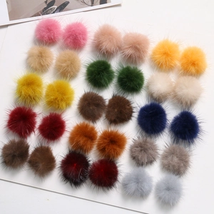 Detailed top view of various 3.5cm colorful mink fur pom-poms for DIY jewelry crafts