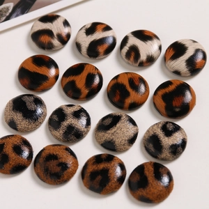 Variety pack of round leopard print fabric covered buttons for DIY jewelry and hair accessories