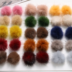Close-up of 3.5cm colorful mink fur balls for DIY hair accessories and jewelry making