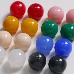 Close-up of 20mm colorful ink-wash resin round beads for DIY jewelry and hair accessories