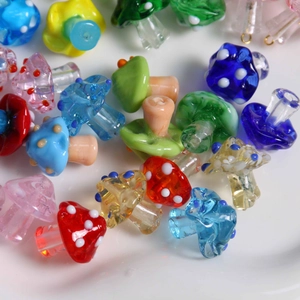 Close-up of colorful polka dot glass mushroom beads for DIY jewelry making