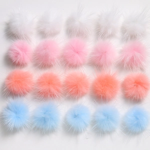 Detailed top view of 3cm colorful plush faux mink balls in white pink and blue for DIY crafts