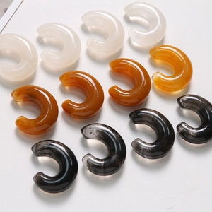 Translucent C-shaped resin charms with ink marble patterns for DIY jewelry making