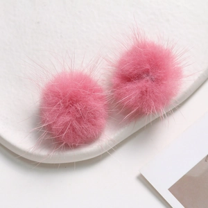 Close-up of pink 3.5cm fluffy mink fur balls for handmade DIY jewelry making