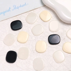 DIY cushion-shaped resin charms in black, cream, and frosted white for jewelry making