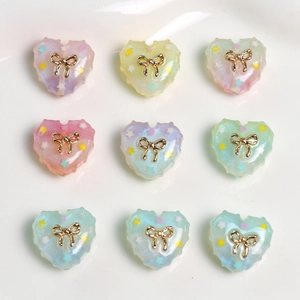 Glitter resin heart charms with gold bows in pastel colors for DIY jewelry making