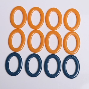 Oval resin link rings in orange and dark blue for DIY earring and jewelry making