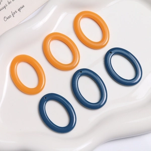 Minimalist oval resin rings in orange and dark blue for DIY earring and jewelry making