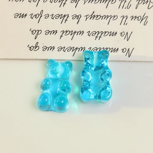 Detail of blue translucent gummy bear resin charms for DIY earring and jewelry making