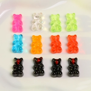 Close-up of assorted translucent resin gummy bear charms for DIY jewelry and crafts