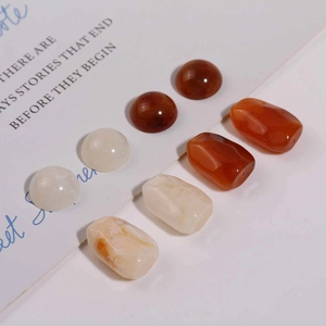 Detailed view of irregular vintage resin beads in mixed brown and amber tones for DIY jewelry