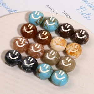 Marbled resin round beads with smiley face icons for DIY jewelry and hair accessories