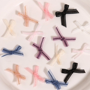 Handmade organza butterfly bows for nail art and DIY crafts in vibrant assorted colors