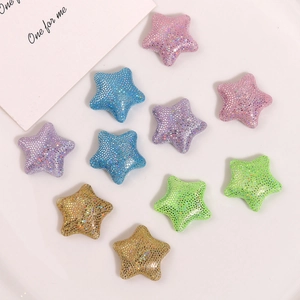 Vue détaillée de patchs étoiles scintillants en tissu pour bijoux DIY et accessoires