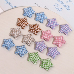 Colorful star-shaped houndstooth fabric patches for DIY hair accessories and clothing