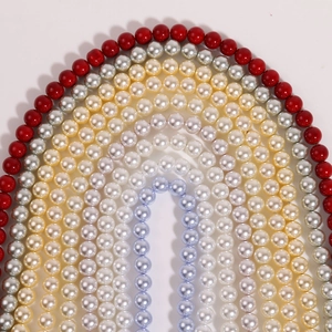 Disposition en arc-en-ciel de perles d'imitation rondes de 10 mm en fils multicolores