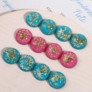 Floral resin cabochons with dried flowers and glitter for DIY earrings and crafts