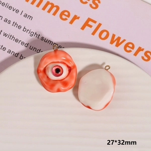 Detail view of scary eyeball charms for Halloween jewelry DIY with 27x32mm size
