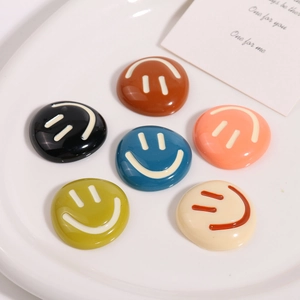 Set of six colorful resin smiley face charms for DIY crafts and hair accessories