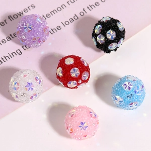 Macro shot of colorful Shamballa beads with snowflake crystals for DIY jewelry making