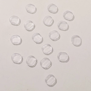 Close-up of transparent silicone anti-slip pads with three-ribbed texture for DIY jewelry