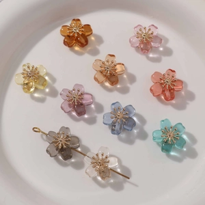 Translucent resin flower beads with gold centers in various colors for DIY jewelry making